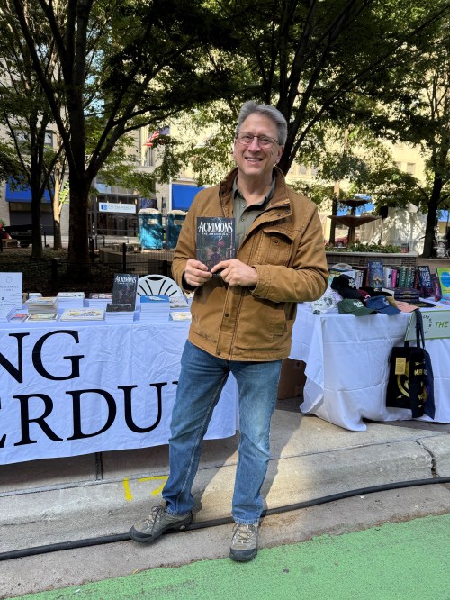Brian Displaying Acrimons Book at LitFest 2025