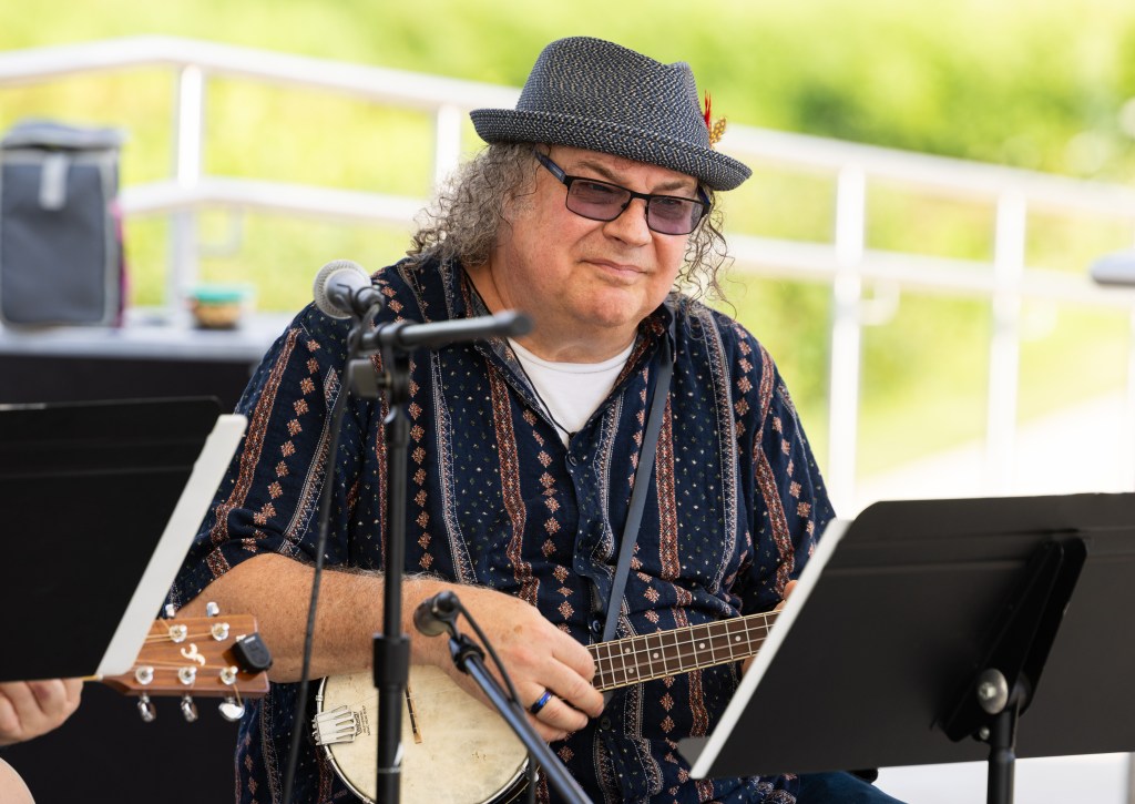 Photo of banjo uke player Dr. Scott Cashman