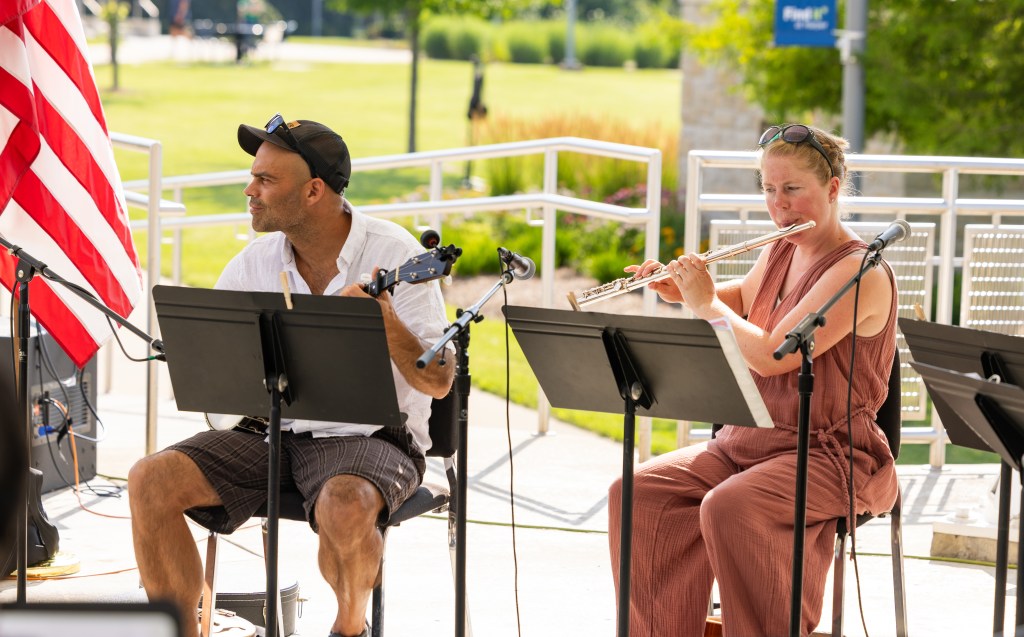 Photo of banjo player Bekr Ali and flautist Emily Frazier
