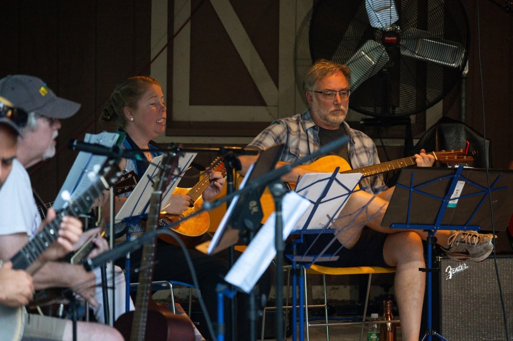 Members of the Back Porch Revue playing at the Spring Valley Nature Center, June 2025